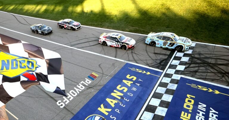 Elliott muscles by battling Toyotas to win at Kansas